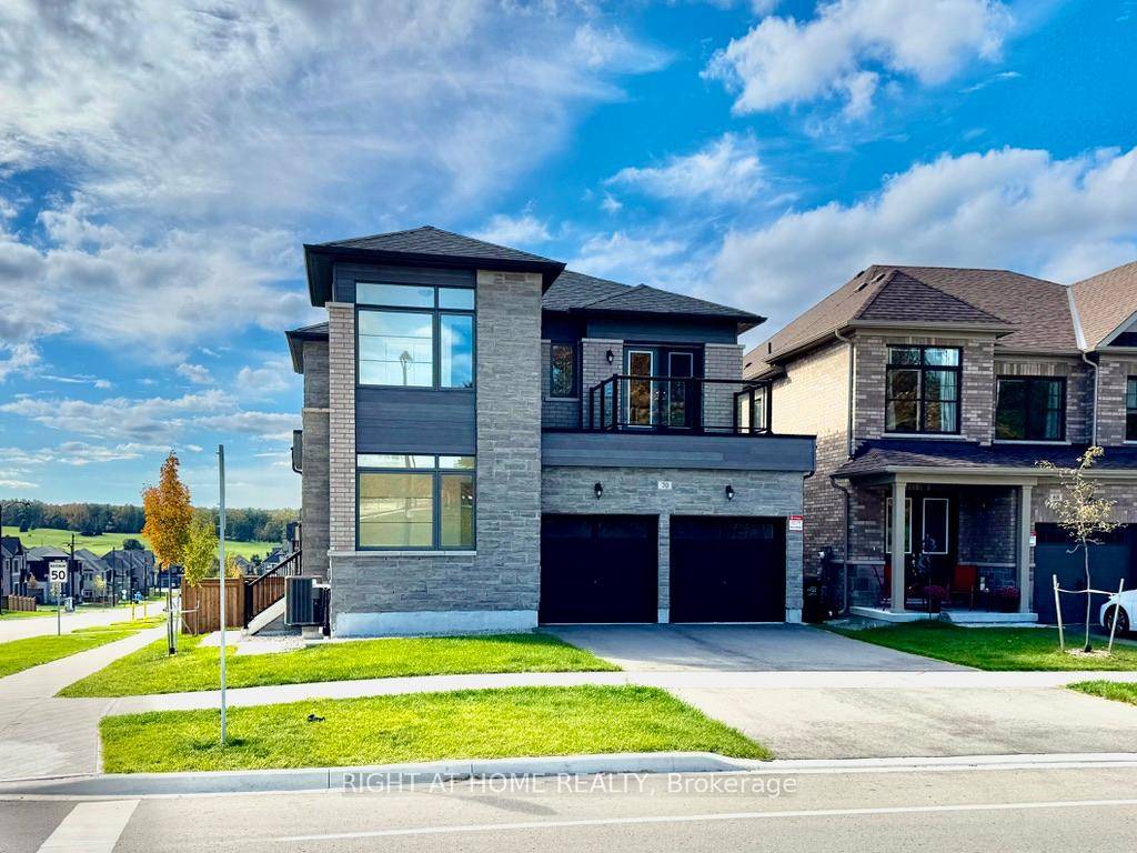 Welcome to this beautiful brand new home filled with natural light from its many windows and corner lot location.