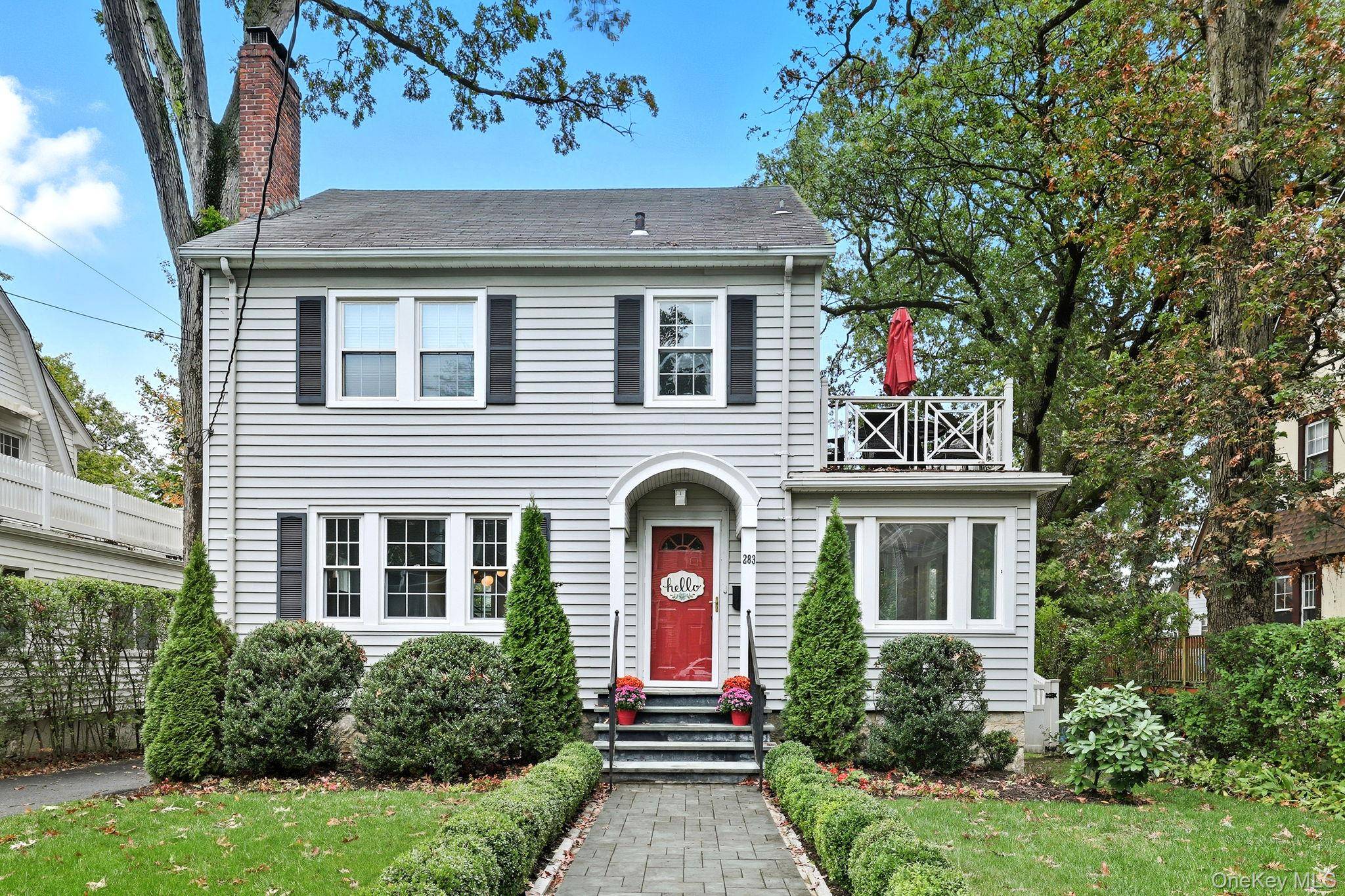 Welcome to this picture perfect Colonial that blends timeless character with fresh, stylish updates.