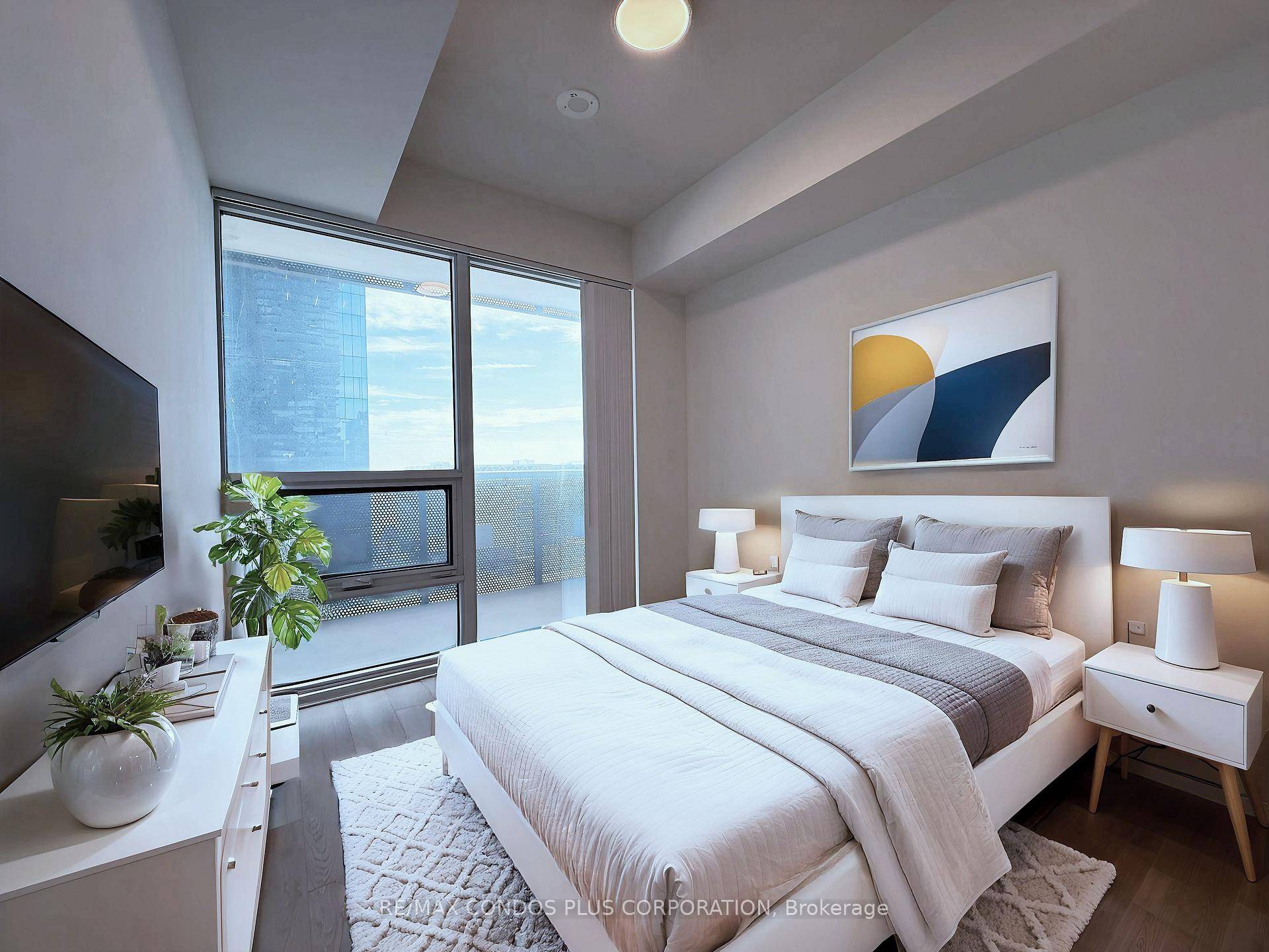 1 Den unit with 1 bath in family oriented Sugar Wharf condos by Menkes, offering 664 sq.