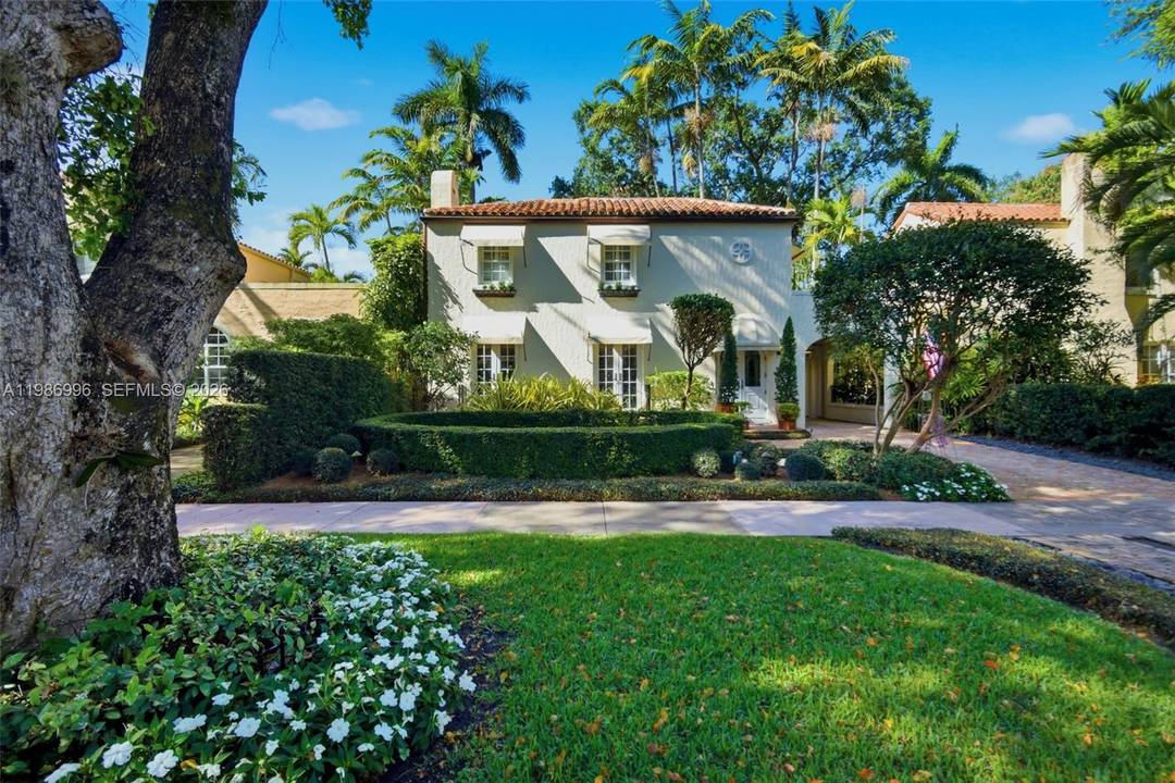 Step into one of Coral Gables most coveted historic treasures located in the Golden Triangle a breathtaking 1928 Old Spanish Classic masterfully reimagined as a romantic Mediterranean Masterpiece, where timeless ...