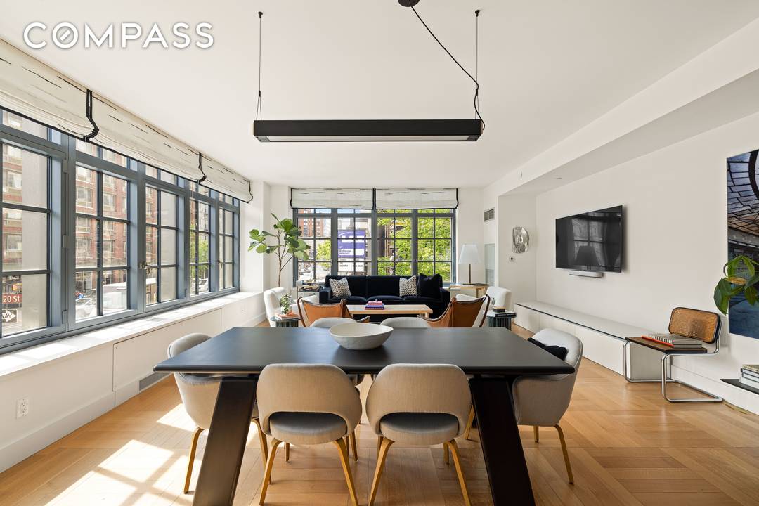 Welcome to 500 West 21st Street, Residence 2G a sun filled corner two bedroom perched above the treetops of West Chelsea.