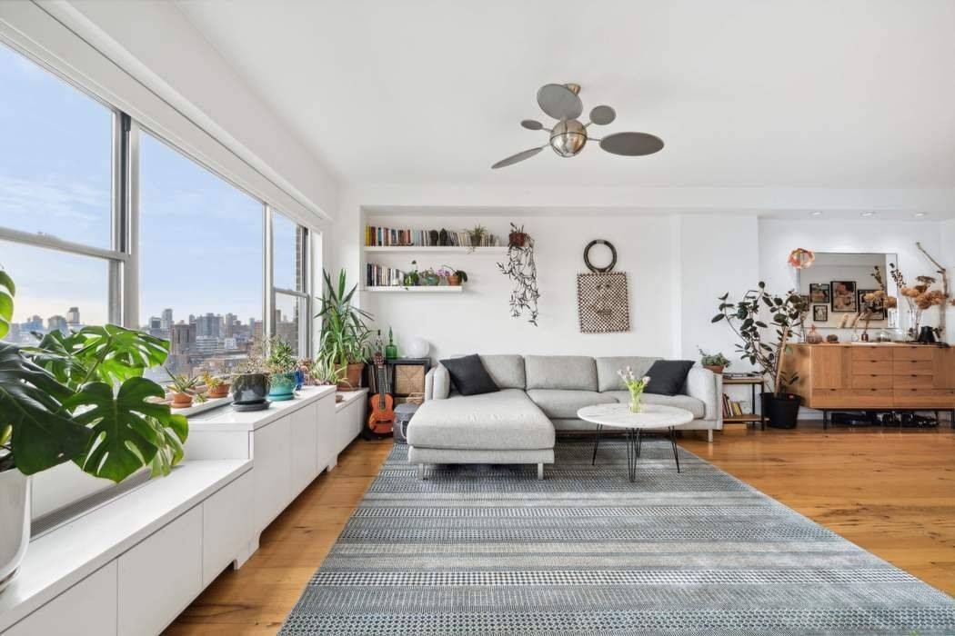 Perched high up on the 17th floor, with magnificent unobstructed views of iconic lower Manhattan, the East River, and Brooklyn, residence D1706 has it all.