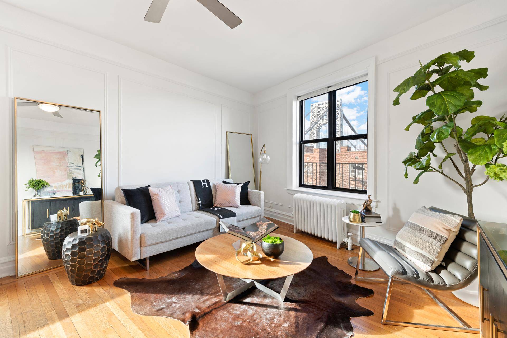 Sweeping city views and the George Washington Bridge framed from your livingroom !