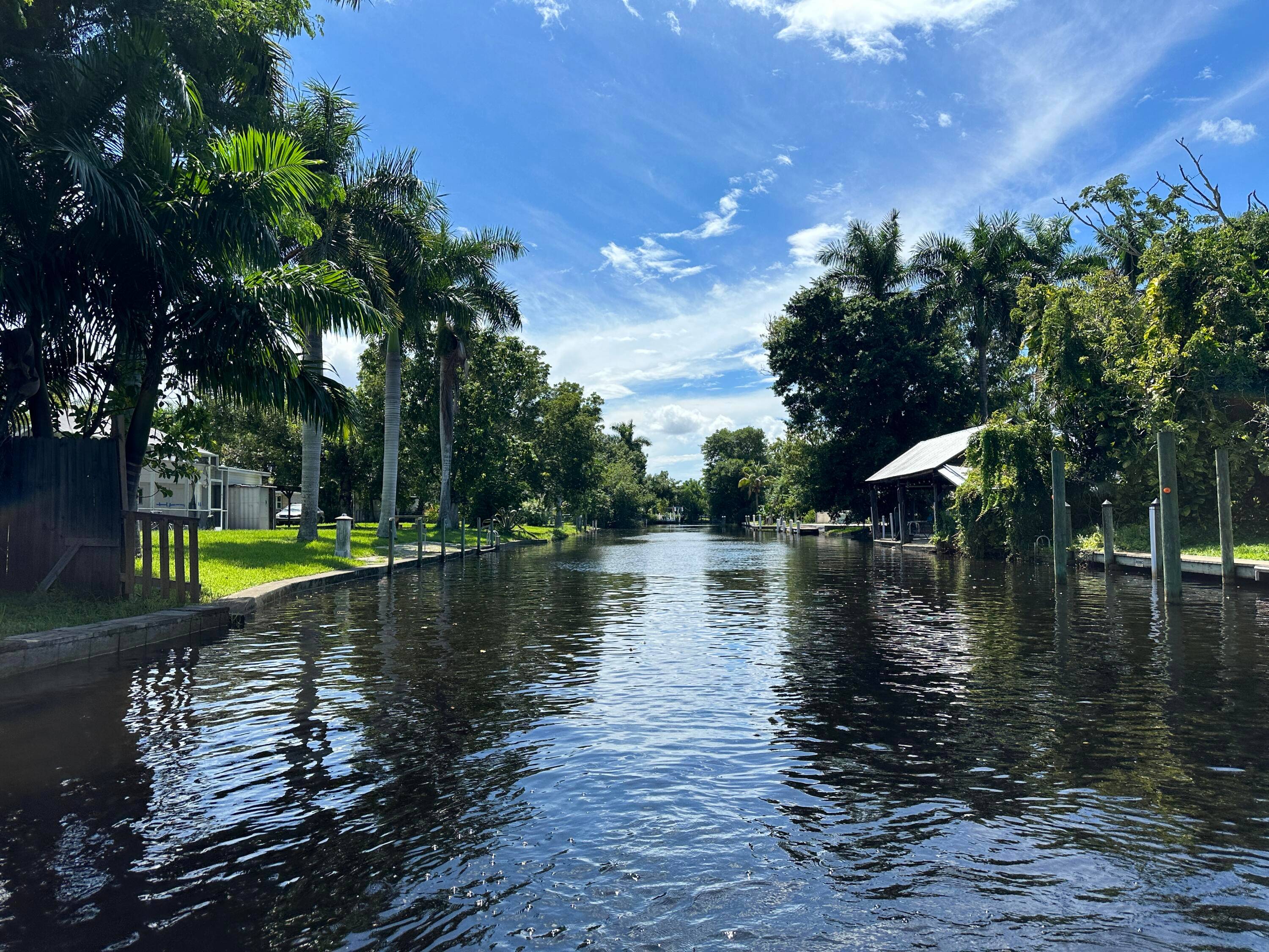 Deep Water, wide canal view with Dock on double lot, Lease Purchase Option OR Purchase w Owner Financing with 10 Down.