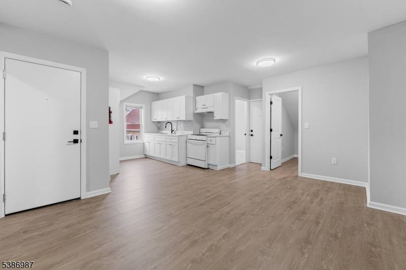 Renovated 3 Family in Paterson offering immediate rental potential !