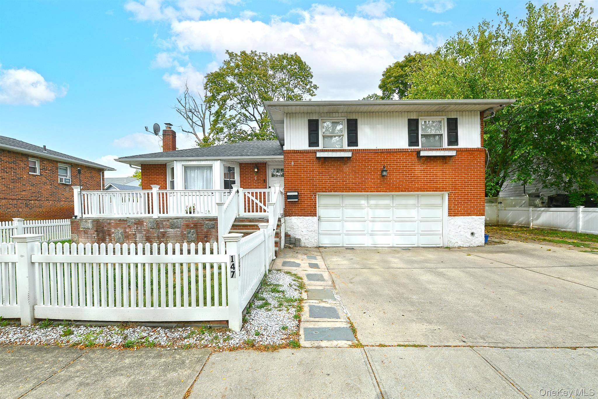 Welcome to this charming mid block split level home, ideally located in the heart of Valley Stream.