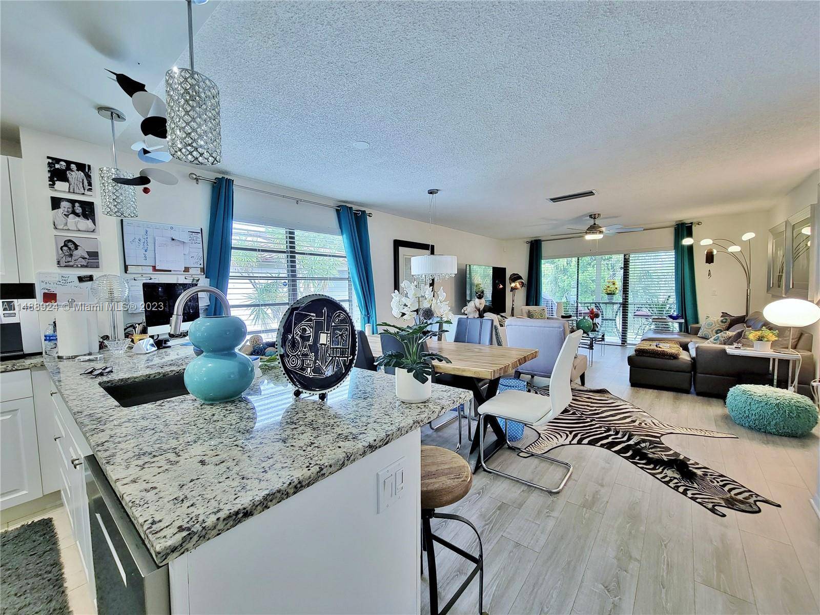 Welcome to your tranquil retreat in Boca Raton's sought after 55 community.