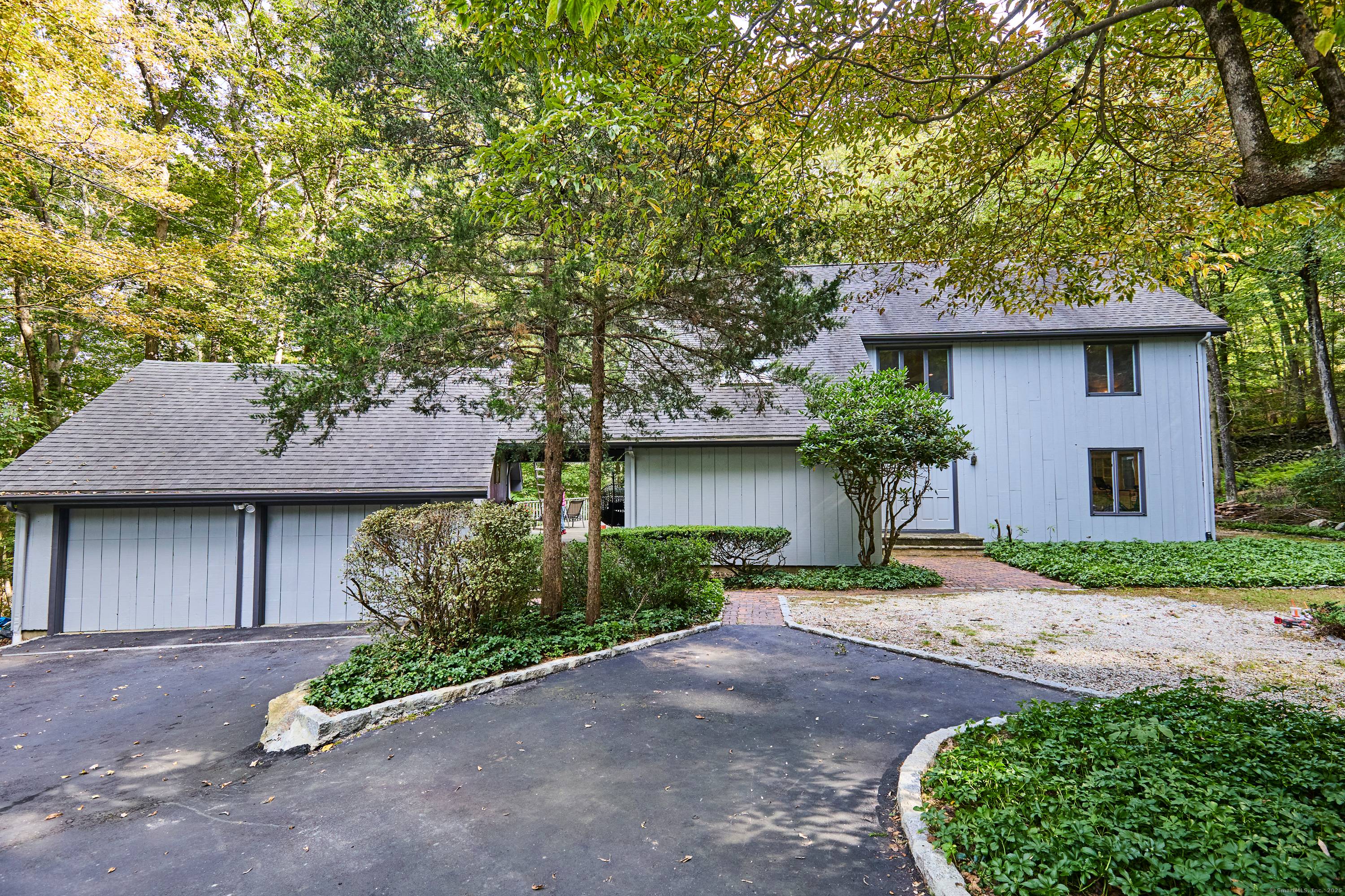 Discover a stunning blend of architectural charm and modern functionality at 191 Steep Hill Road, Weston, CT.