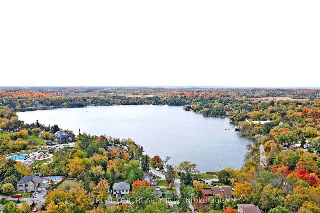 Beautifully Fully Professional Renovated Custom Built Bungalow With Direct Westerly Lake Views.