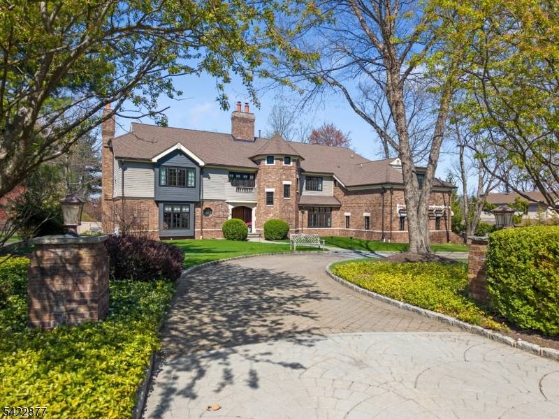 Experience resort style living in this exceptional North Caldwell residence, where timeless craftsmanship meets modern luxury.