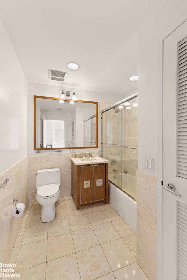 This bright and generously sized east facing alcove studio offers abundant natural light and open city views through oversized windows.