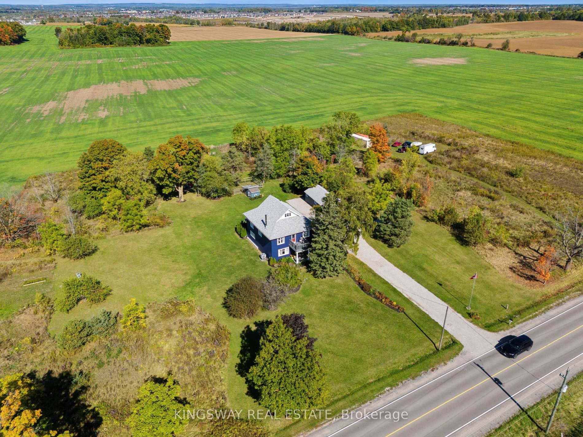 Escape the city and embrace the charm of country living on this breathtaking 5 acre estate in Innisfil.