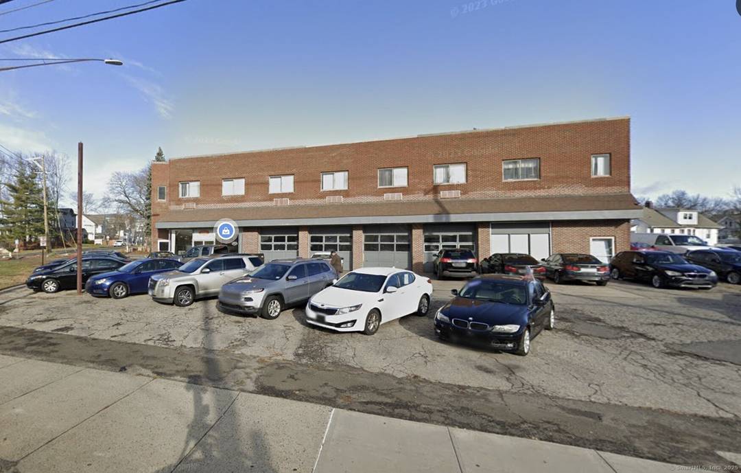 Retail building near city center with many permitted uses.