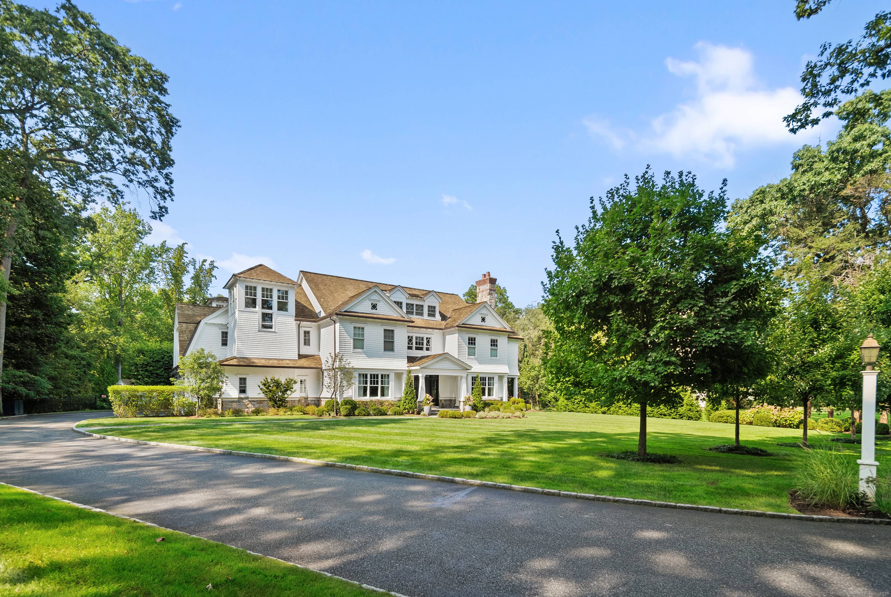 Masterfully crafted by Mattera Construction, this 12, 000 sq ft residence sits on 1.