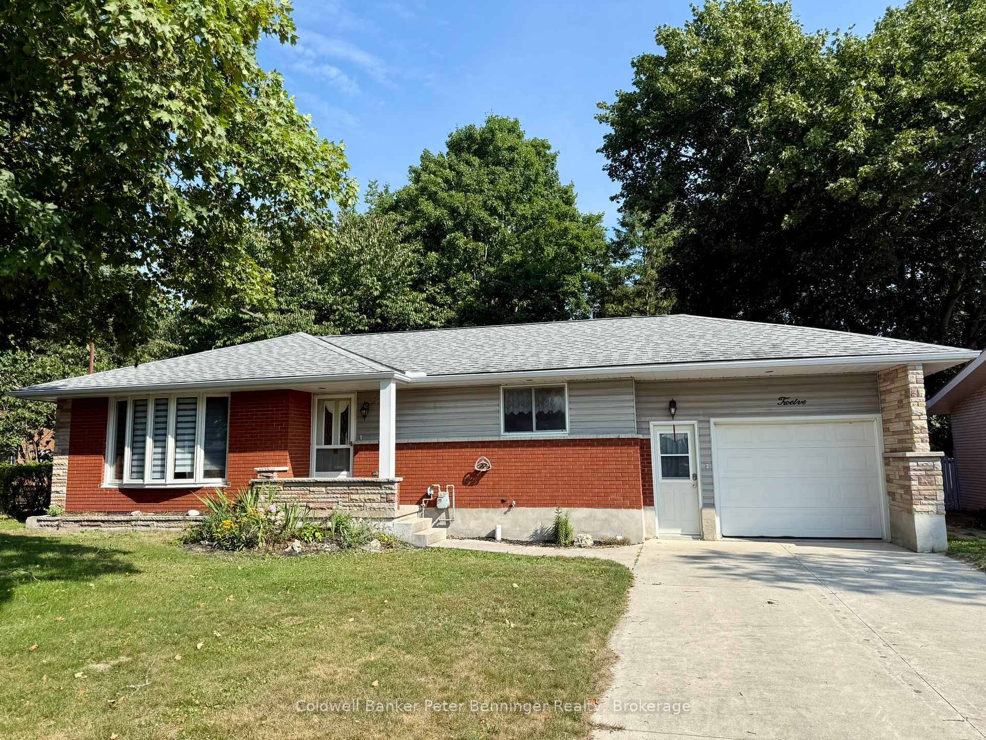 Charming bungalow with ravine yard and fully finished basement.
