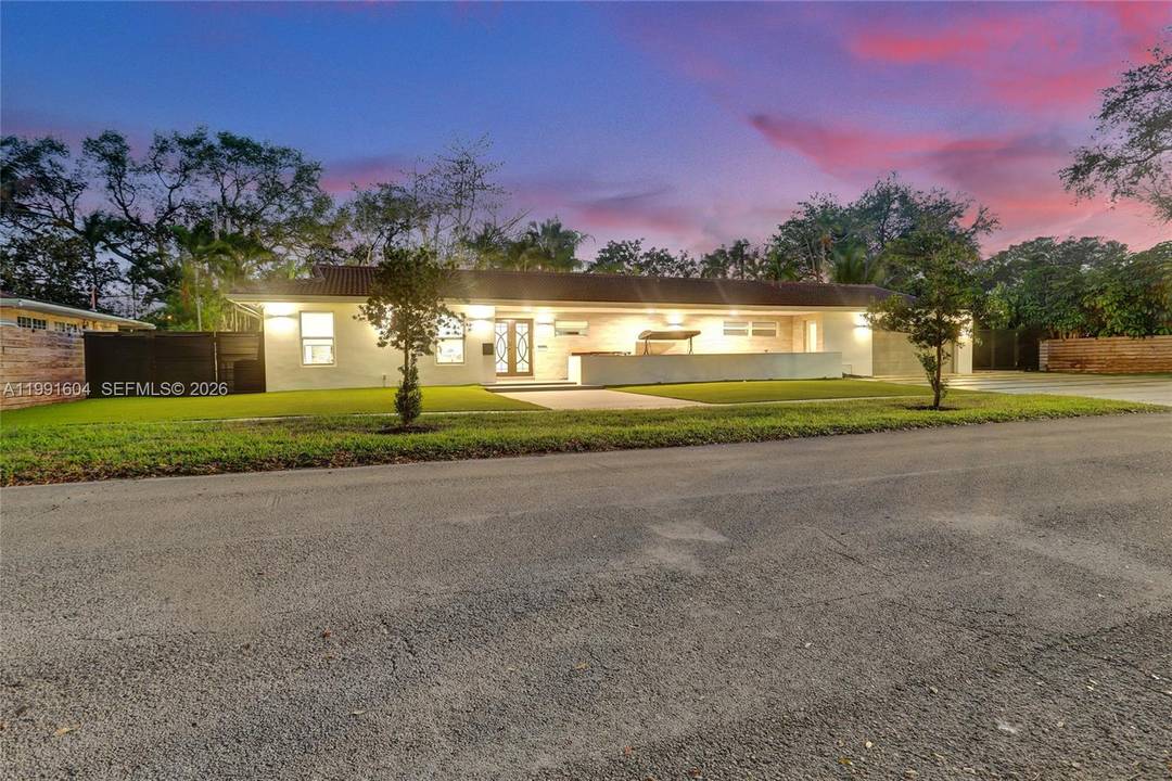 Welcome to this beautifully maintained modern one story home in the sought after Skylake neighborhood of North Miami Beach.