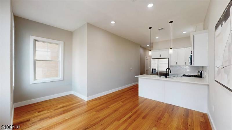 Welcome to modern city living in this brand new construction 2 family home located in the vibrant Marion section of Journal Square.