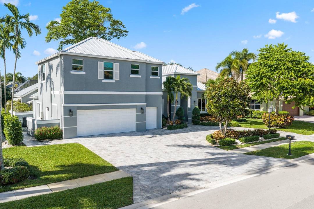 Totally renovated 5 Bedroom residence with office convertible 6th Bedroom situated on the 13th fairway in Boca Grove.