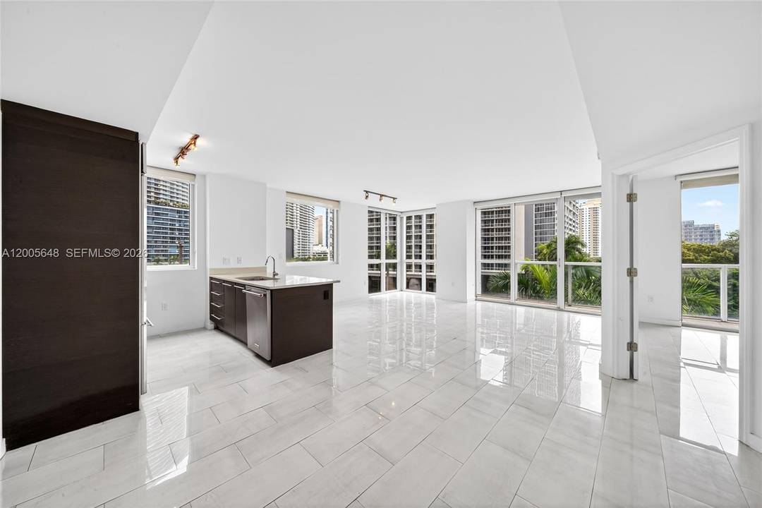 Incredible turnkey corner unit rarely available in 500 Brickell East with floor to ceiling windows filled with an abundance of natural light in every corner !