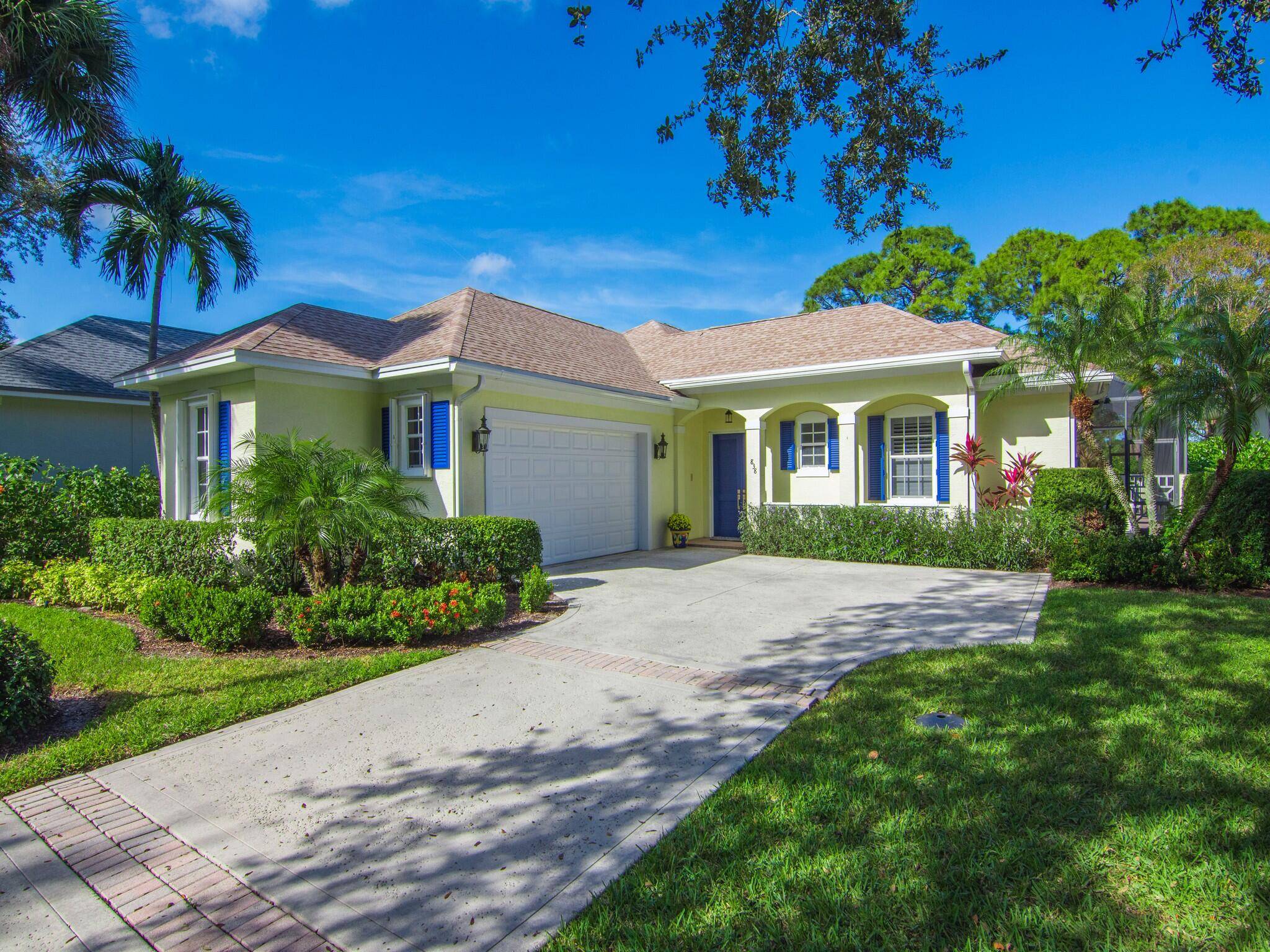 This exquisite courtyard pool home is nestled on a lush golf course, offering breathtaking views of the 10 18 fairways.