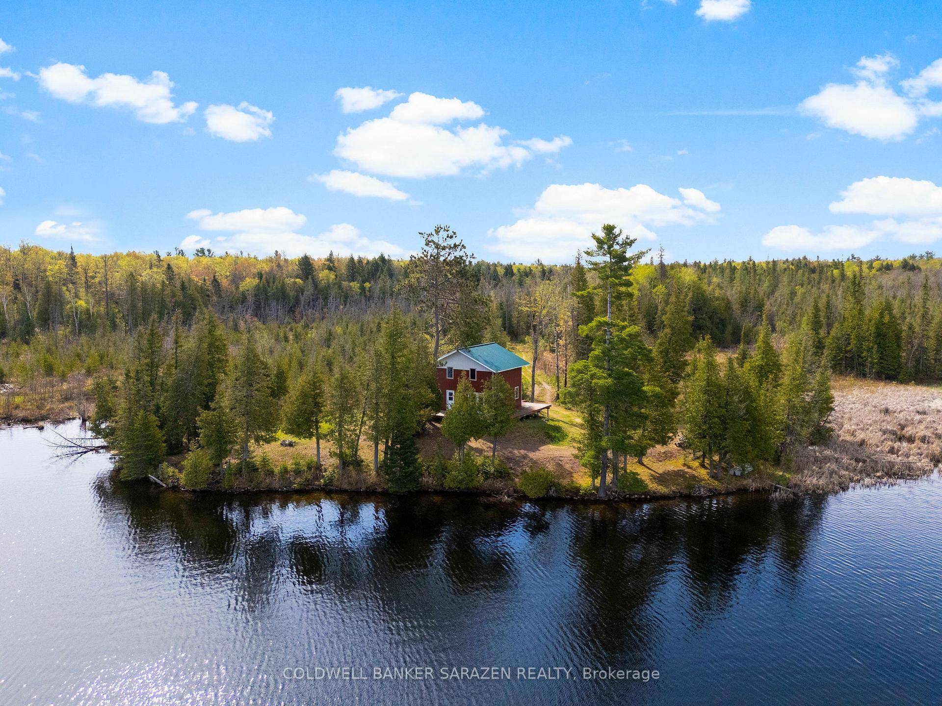 Peace and Tranquility this is what you will find at this private waterfront hideaway, only 1 km in off hwy 511.