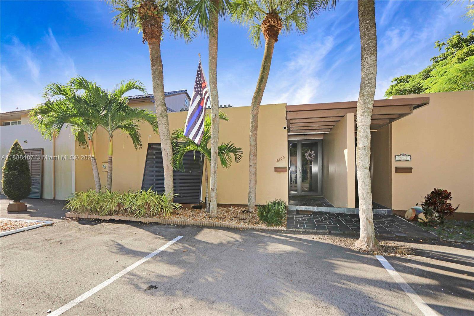 Waterfront townhome on Loch Lomond East across from Miami Lakes Golf Club homes.