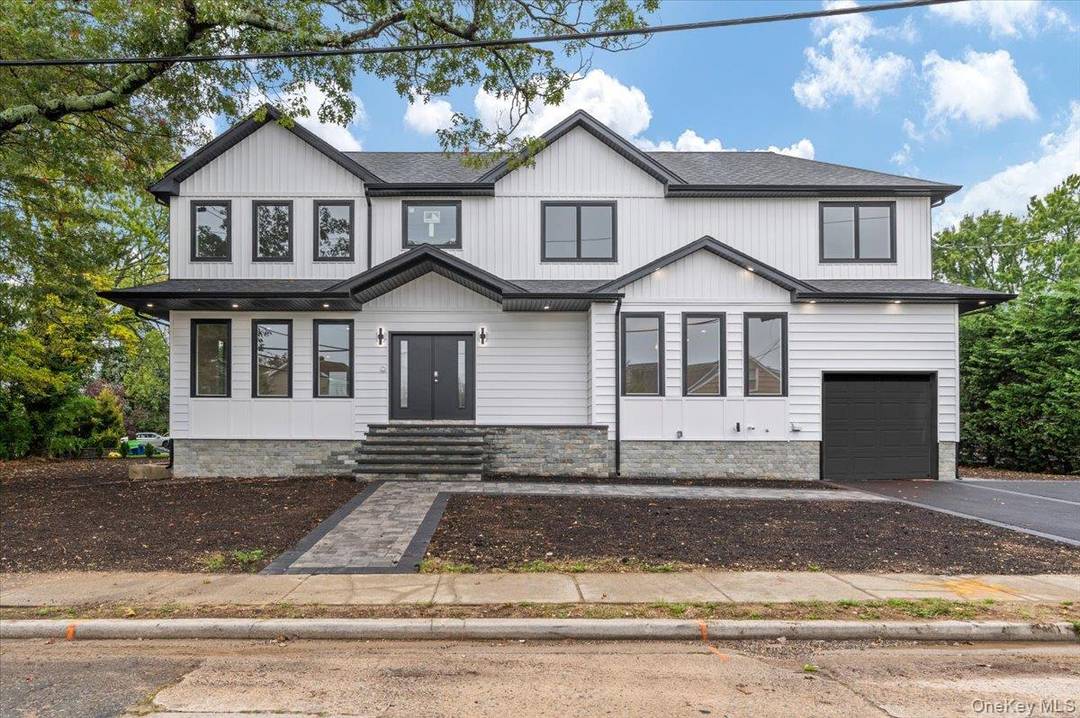 Welcome to 1028 East Broadway a stunning new construction offering 6 Bedroom and 5.