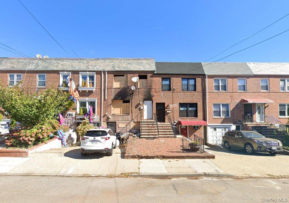 Don't miss this exceptional, fully renovated brick home in Jamaica !