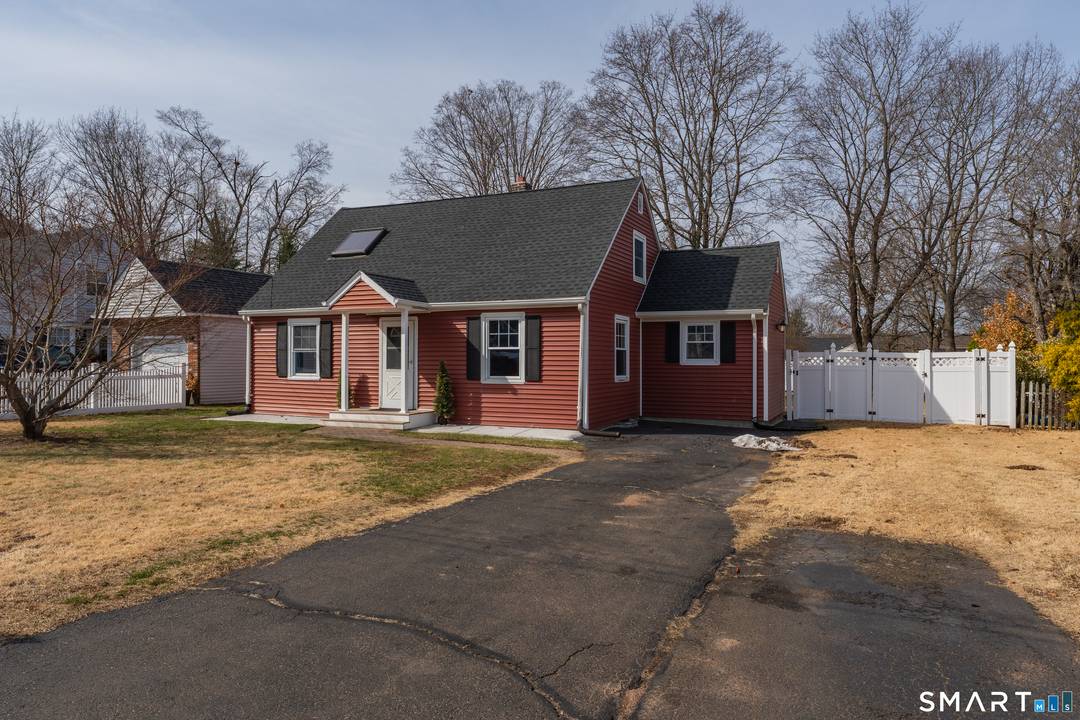 Welcome home to this remarkably spacious 5 bedroom, 2 full bath Cape set in a quiet, lovely East Haven neighborhood.