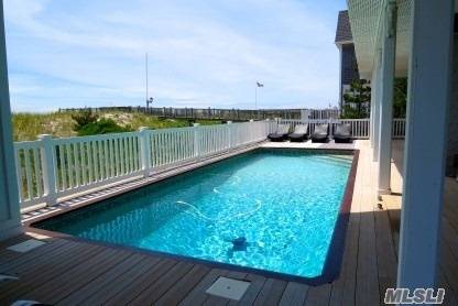 Spectacular Oceanfront Post Modern features an open living area with fireplace, kitchen with top of the line appliances, dining area, den, a master suite with sitting area plus 4 guest ...