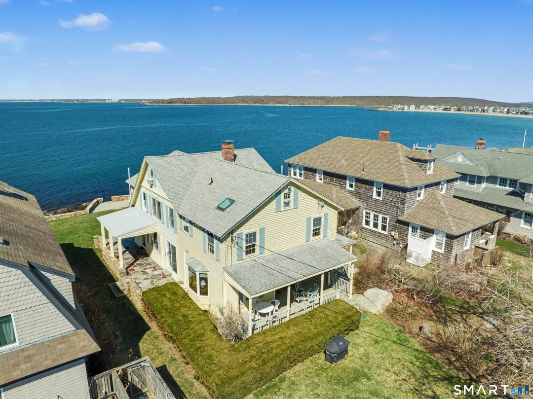 Experience coastal living at its finest with this direct waterfront rental in Groton Long Point.