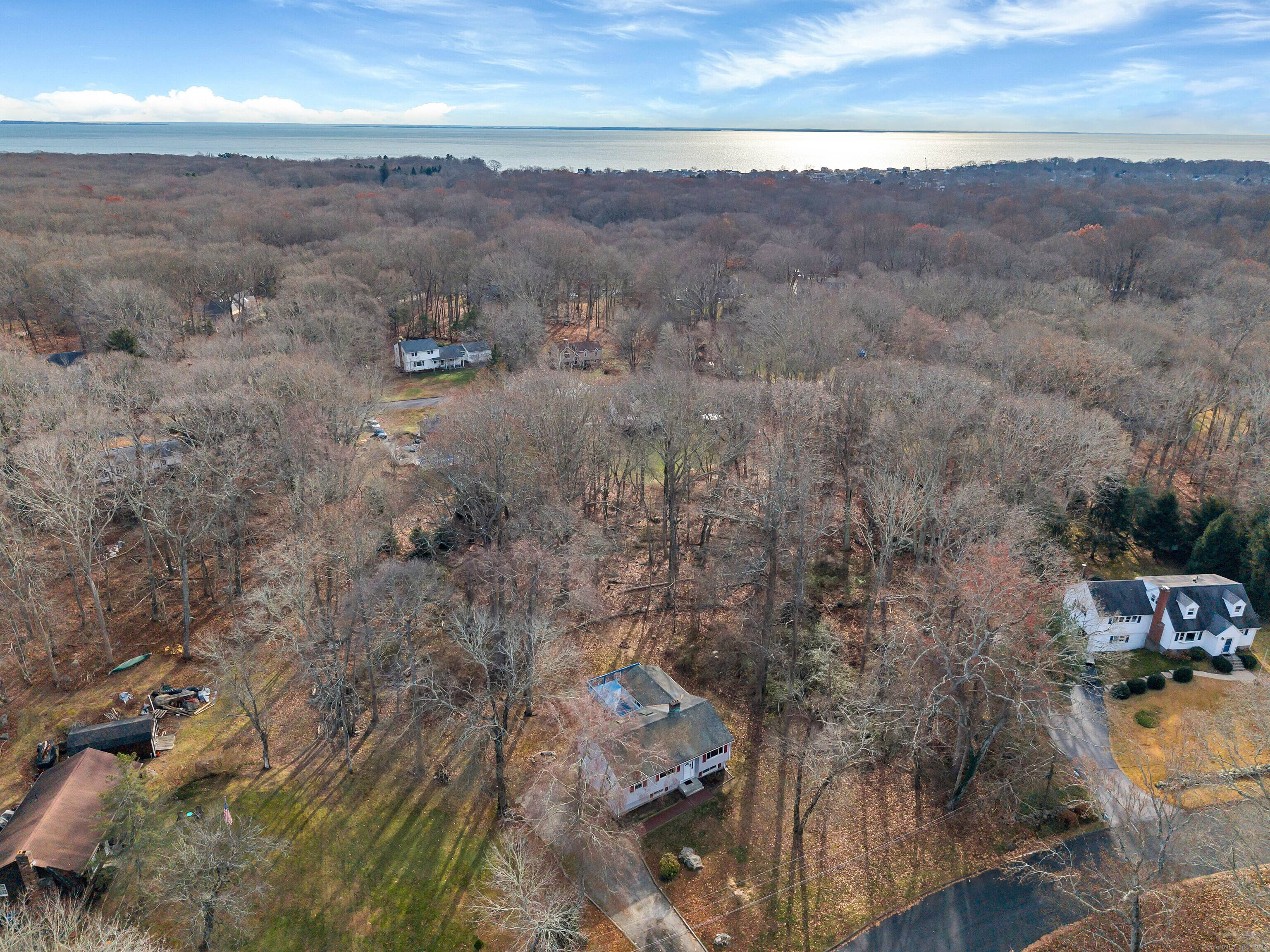 A spacious raised ranch with four bedrooms and two full bathrooms on over an acre of land at the end of a cul de sac provides both privacy and plenty ...