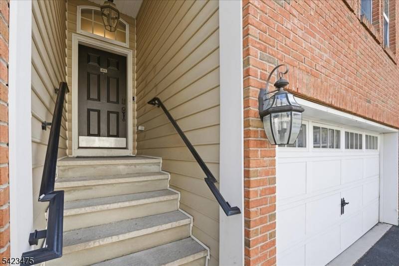 Welcome to this beautifully maintained brownstone style townhome built in 2008 by Centex Builders, offering approx.