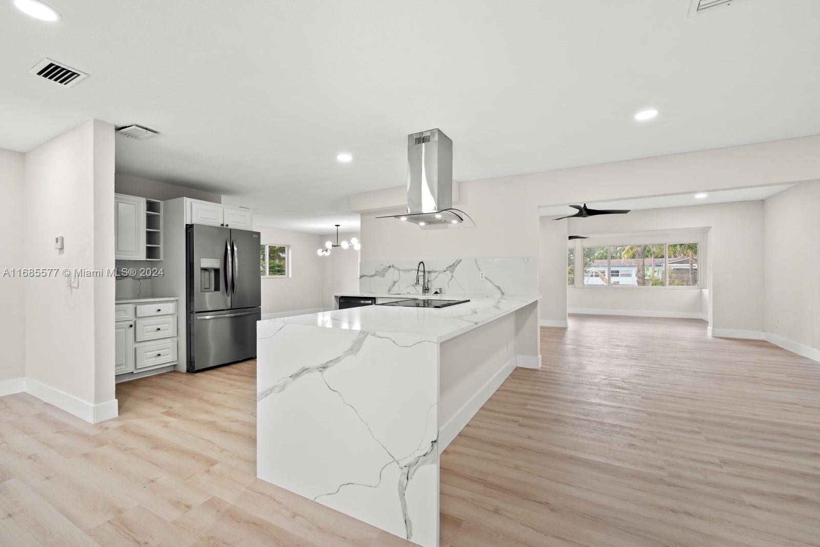 Nestled in a charming neighborhood at the Plantation Fort Lauderdale border, this home boasts a prime suburban spot.