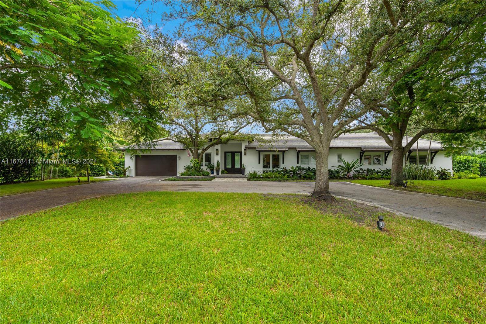 Step into this luxurious 2016 custom built timeless design home, set on a serene acre lot.