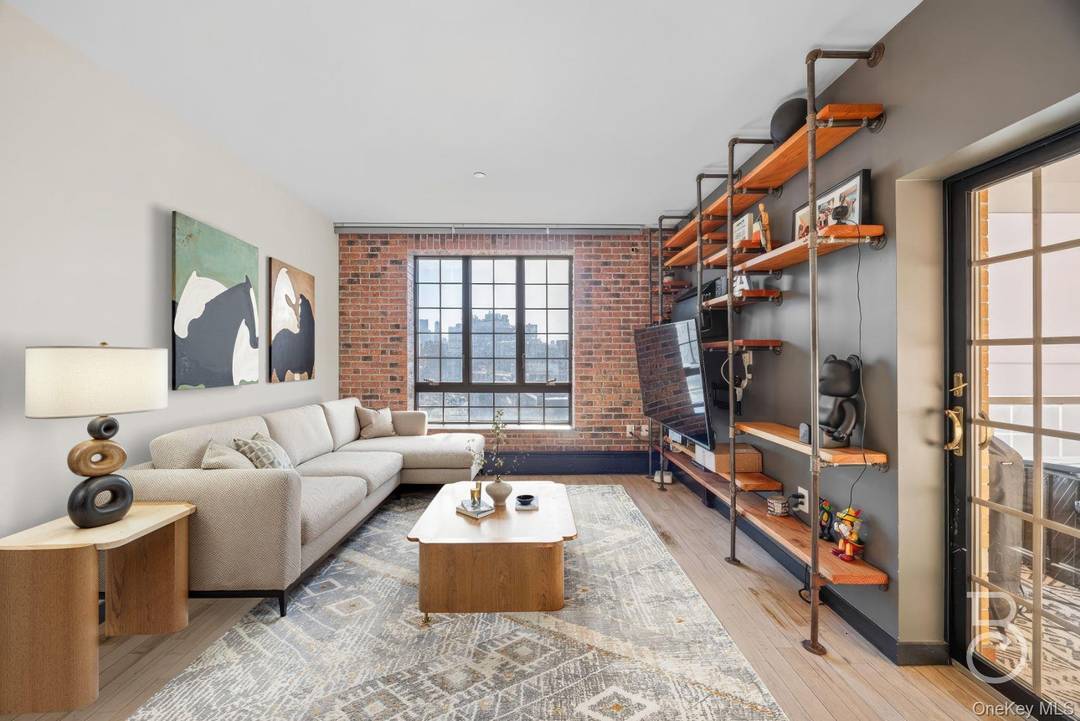 Welcome home to a truly special one bedroom condo in the heart of Astoria, which includes deeded parking.