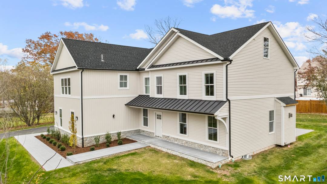 Welcome to 11 Laurel Hill Rd an exceptional newly constructed custom residence offering 3, 657 sq ft of refined living.