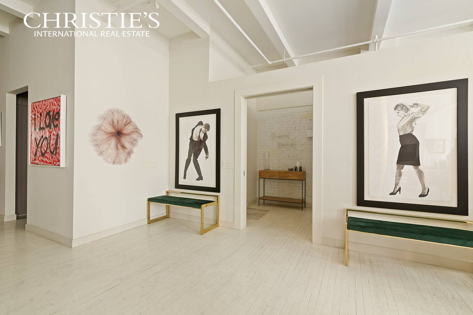 Crossing the threshold from your private keyed elevator into this 4, 000 sq ft loft, historic columns and soaring ceilings welcome you home.