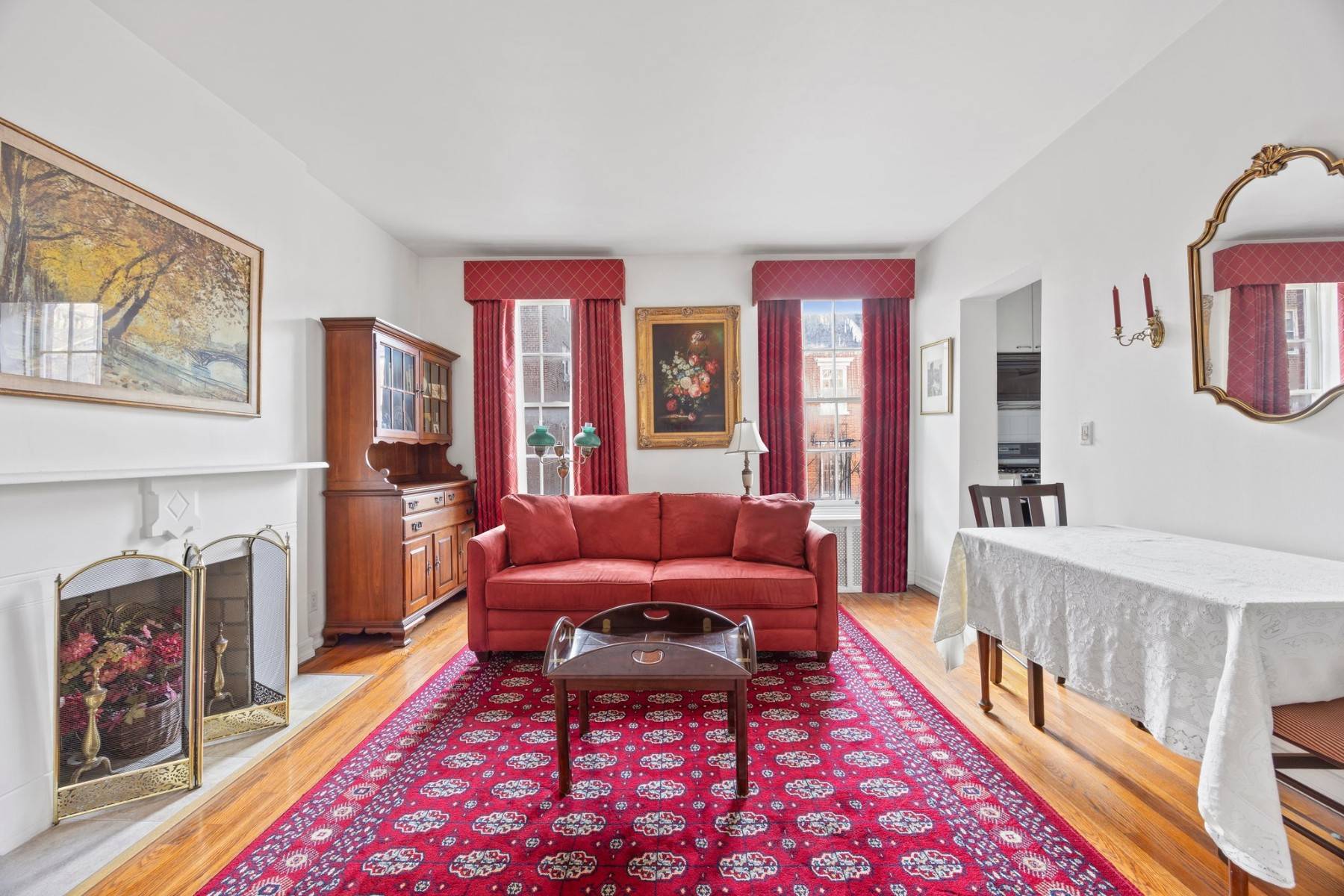 On a postcard perfect street in Manhattans most charming neighborhood, this sunny studio apartment with a working fireplace is now available in the West Village !