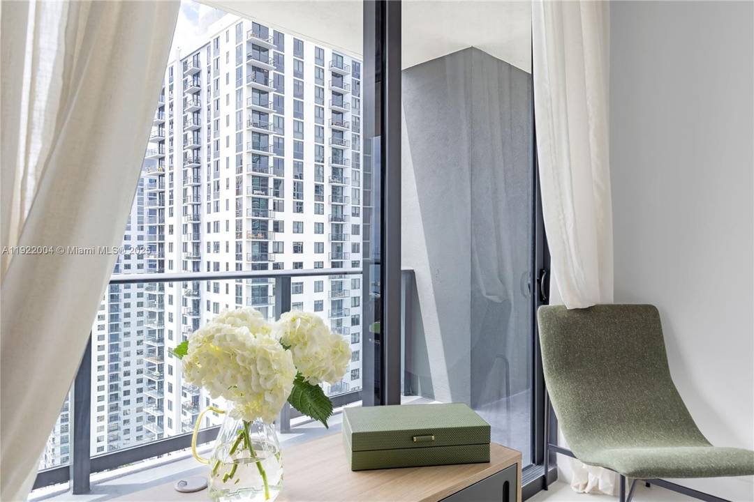 Step into this fully furnished, move in ready residence showcasing stunning city and bay views.