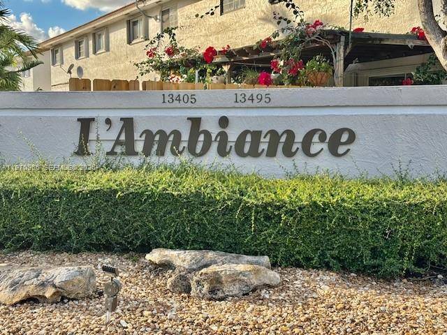 Confident, move in ready townhouse for sale in 33183, featuring an updated kitchen and a striking living room accent wall that elevates everyday living.