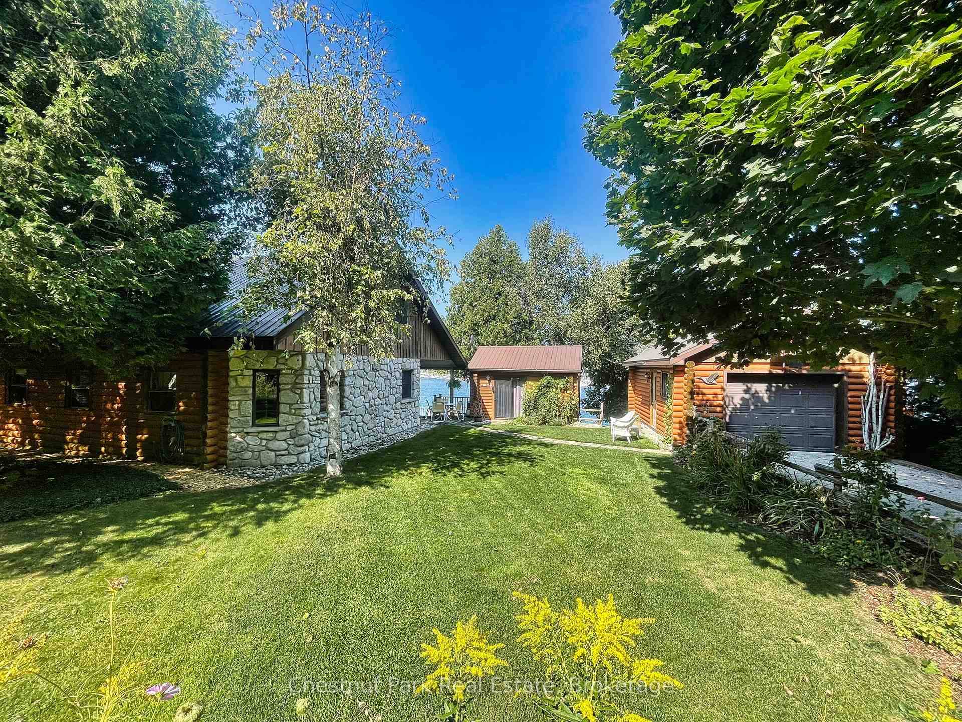 Nestled in the heart of the picturesque hamlet of Lions Head, this unique waterfront property offers the perfect blend of charm, privacy, and convenience.