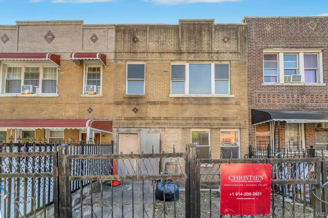 Beautiful 2 family brick house featuring 6 bedrooms and 2 bath with finished Basement and parking for 2 cars !