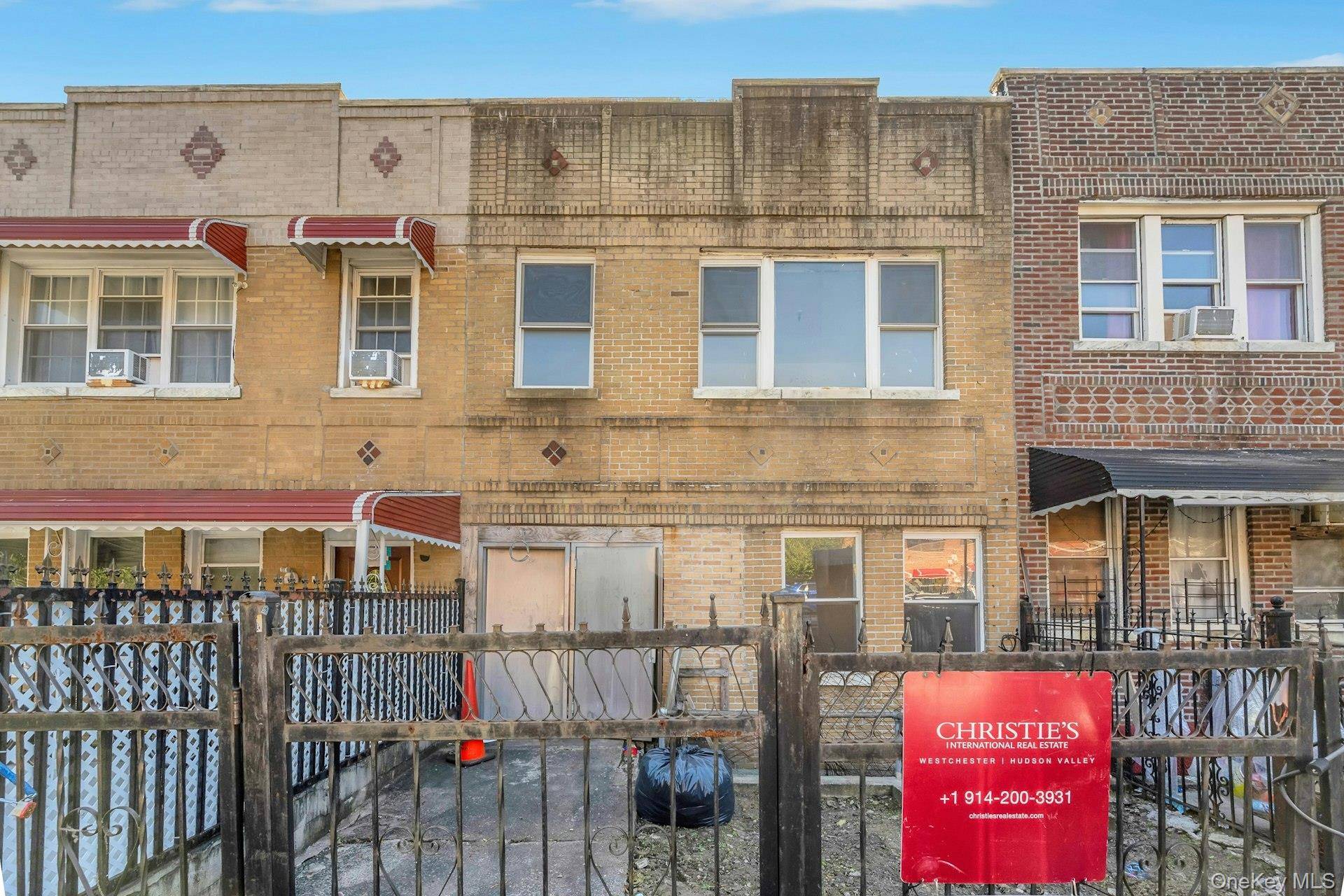 Beautiful 2 family brick house featuring 6 bedrooms and 2 bath with finished Basement and parking for 2 cars !