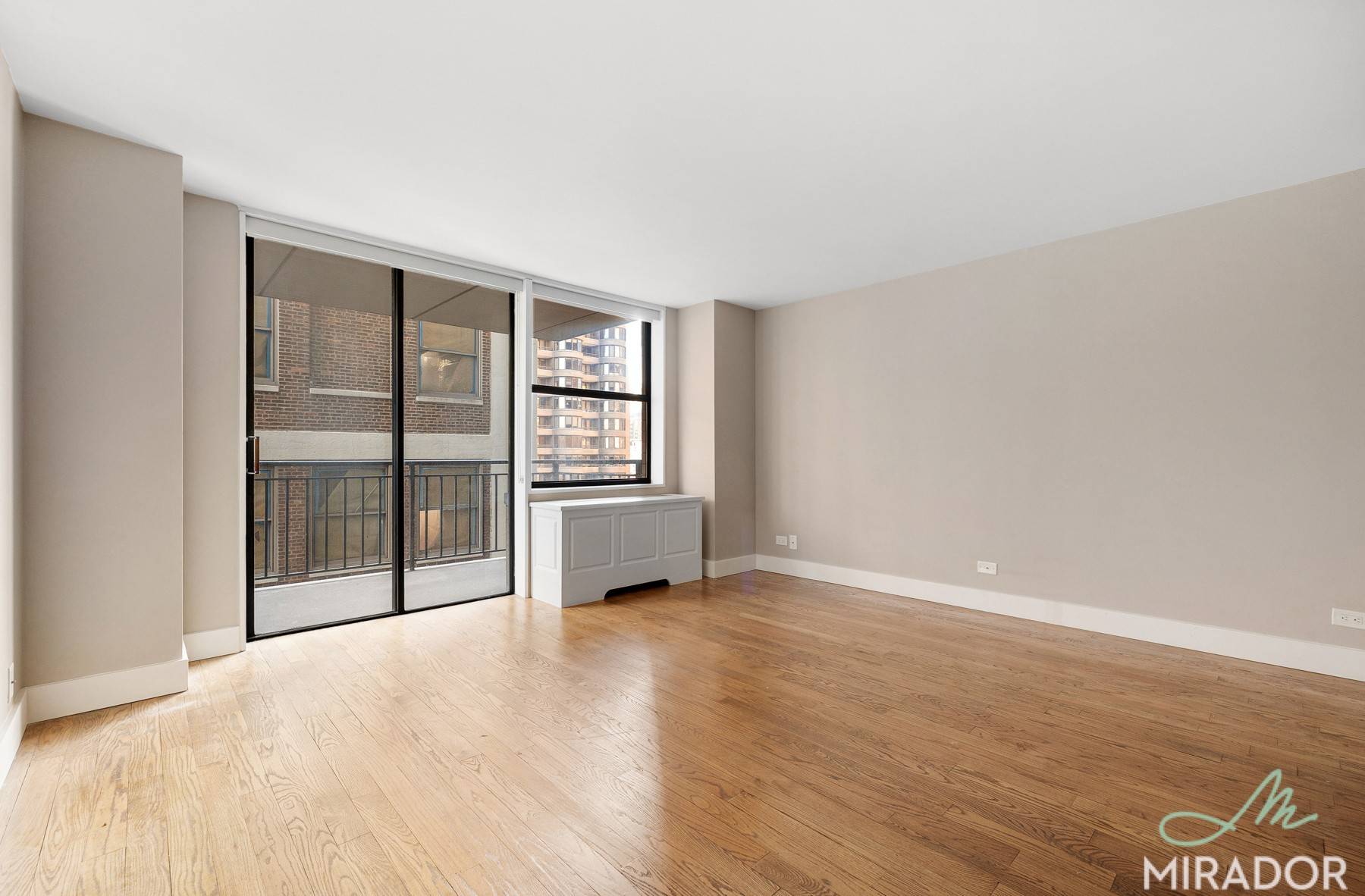Stunning gut renovated 2 bedroom 1 bath with a private balcony and water views at New York Tower.