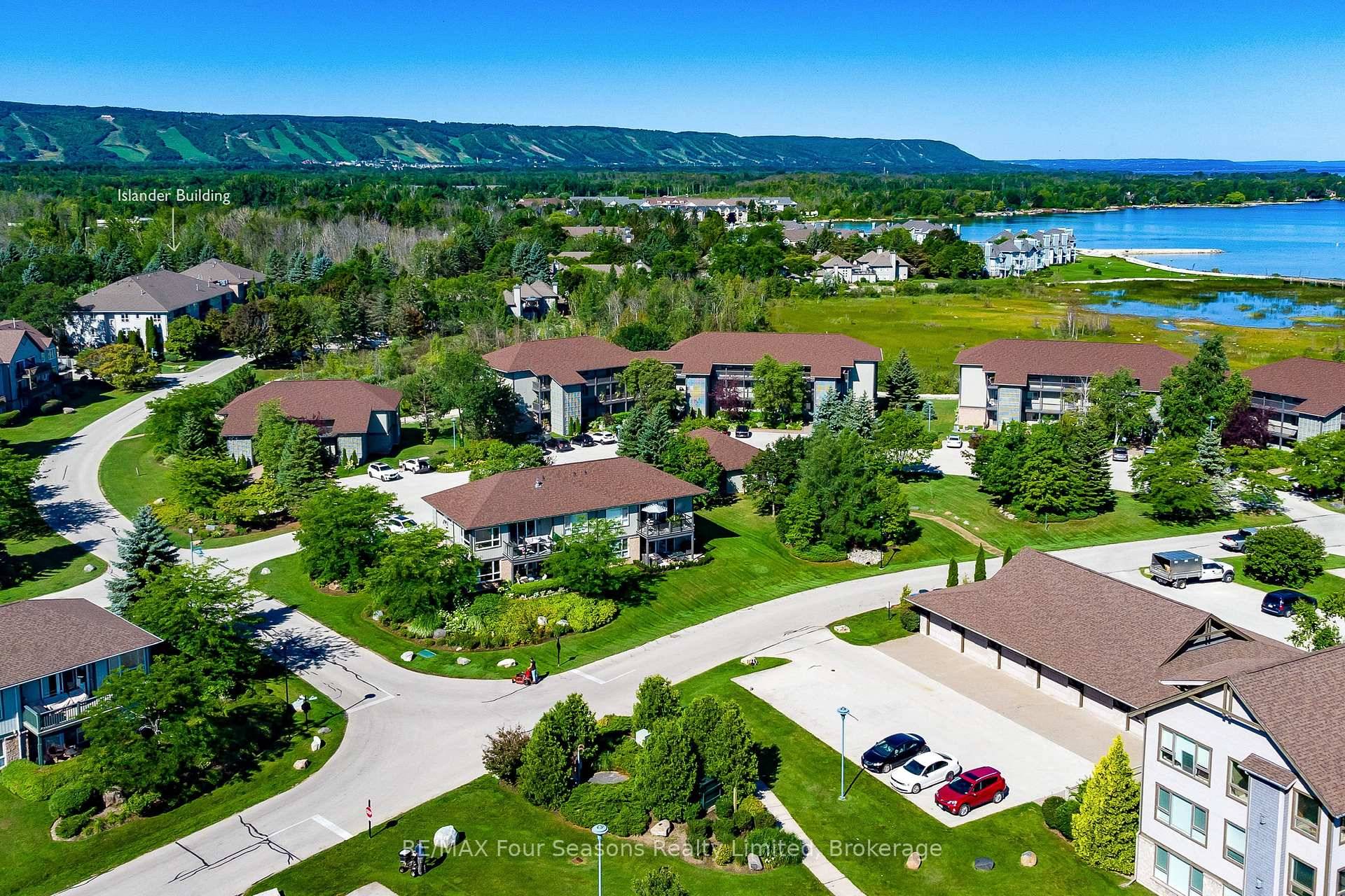 2 bedroom, 2 bathroom condo located in The Islander Building at Collingwood's prestigious Lighthouse Point Yacht and Tennis Club featuring hardwood floors, a North facing balcony, gas fireplace and large ...