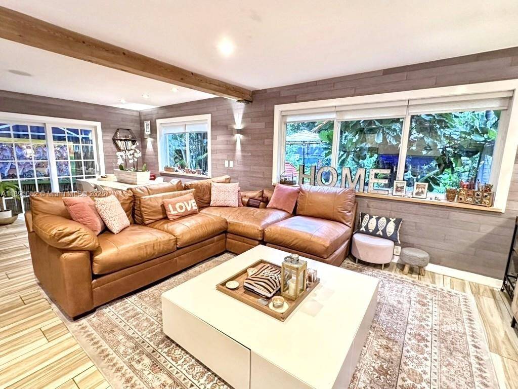 Discover a one of a kind beachside retreat with a private patio and fenced in garden, featuring a 2 bedroom, 2 bathroom layout with an open layout kitchen that seamlessly ...
