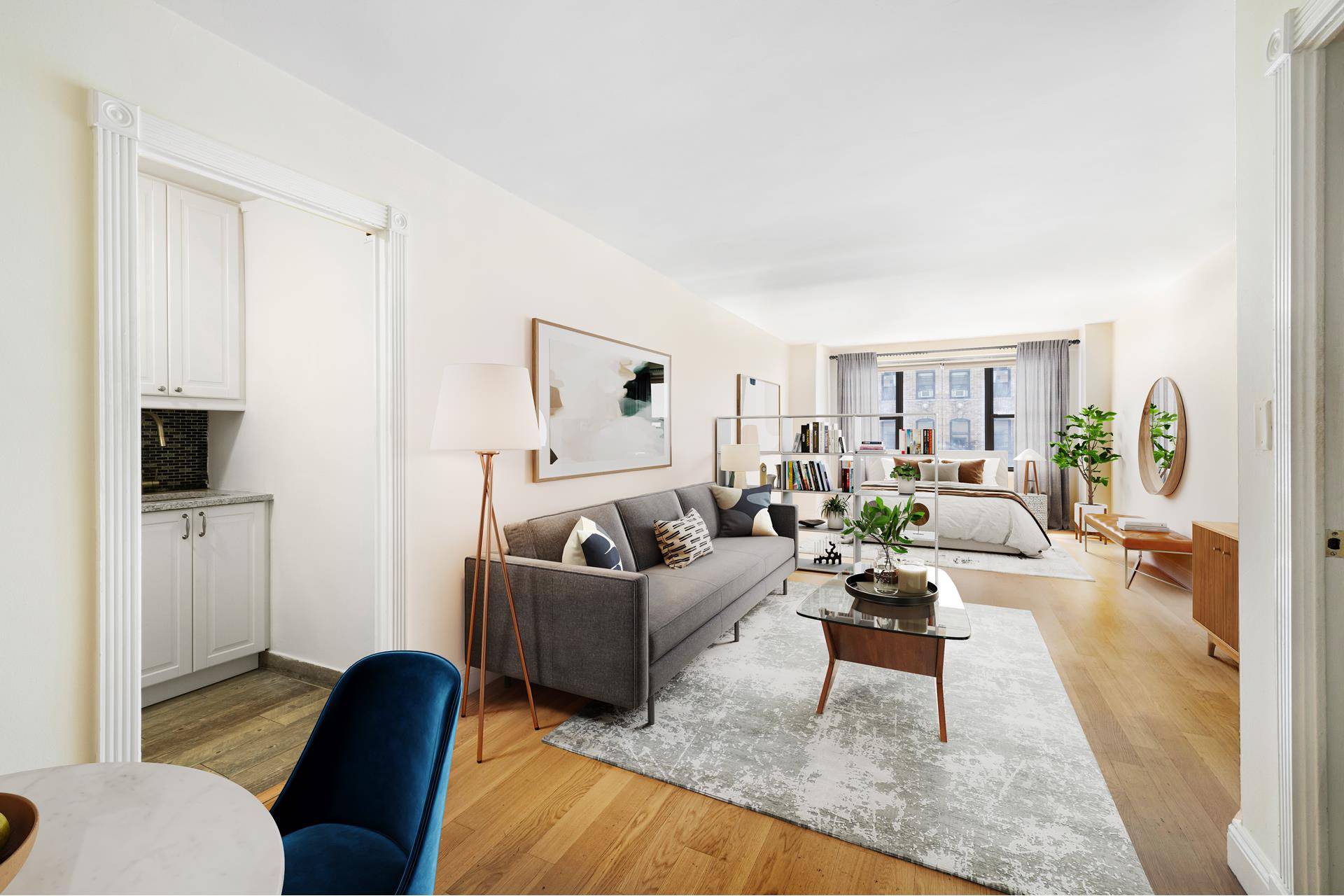 This airy and bright studio has large south facing windows that bring in sunlight all day long.