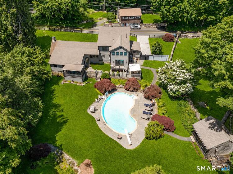 Step back in time without sacrificing modern comfort at the historic Ebenezer Hawley Homestead, a remarkable circa 1785 Antique Colonial nestled on a beautifully landscaped property in Ridgefield.