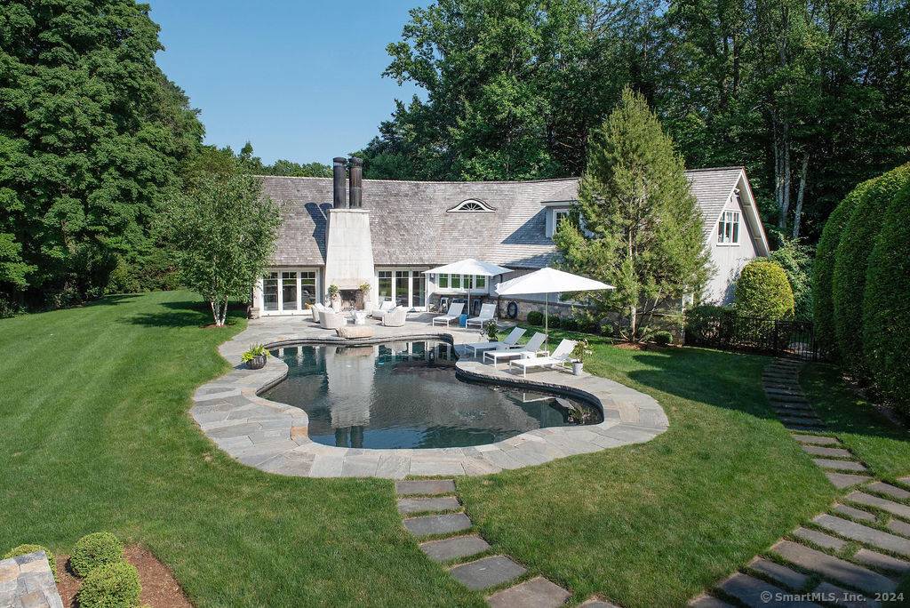 474 Brookside Road is a rare, turnkey Connecticut estate an elegant 1938 home set on 2.